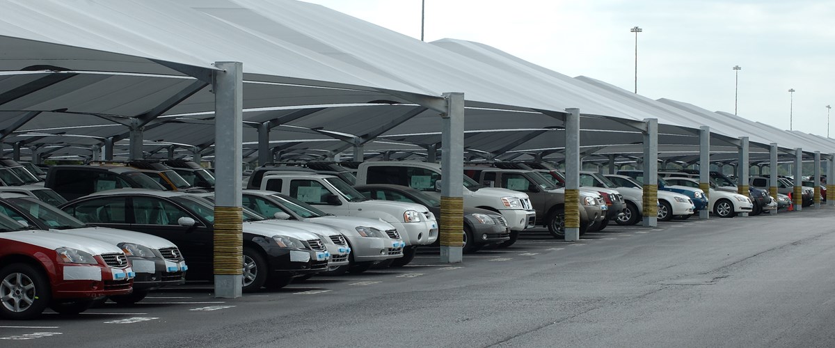 Cars parked under shade structure