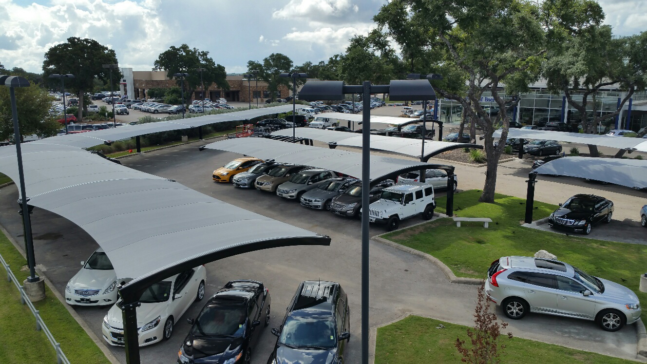 panorama cantilever shades covering cars thumbnail