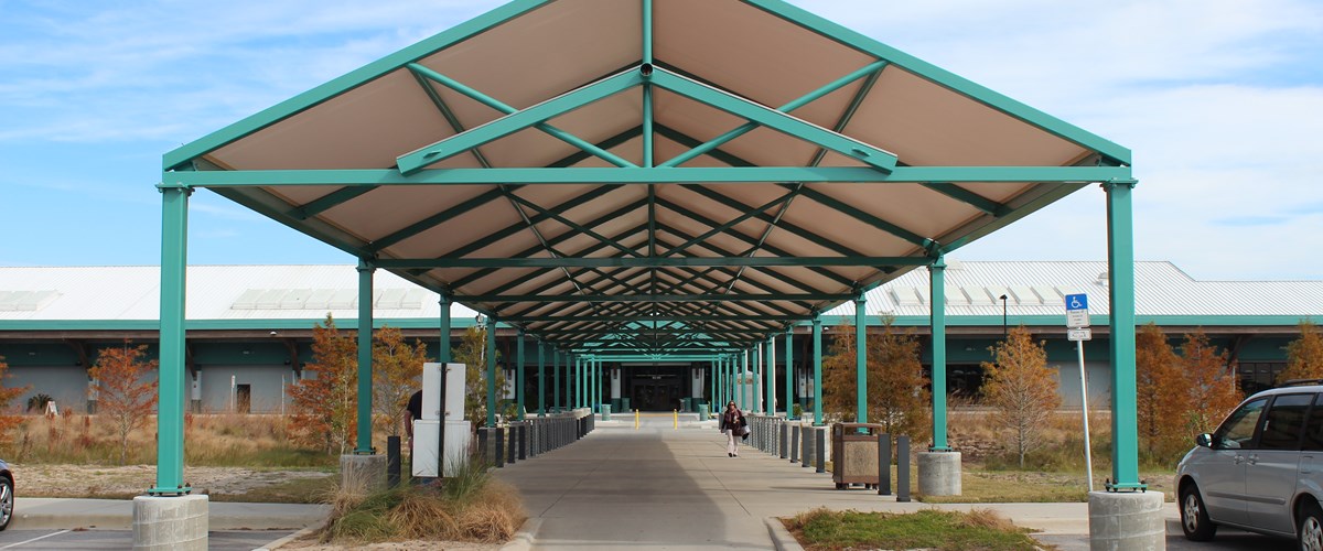 shaded structure at entrance of airport thumbnail