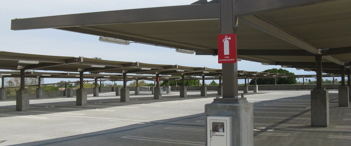 Covered rooftop canopy with fire extinguisher sign