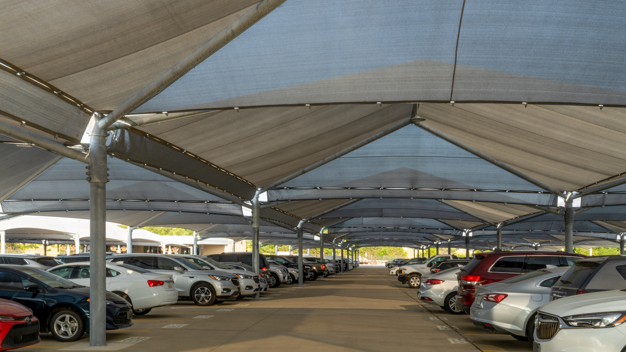 consolidated rental car facility at DFW airport, shaded car parking